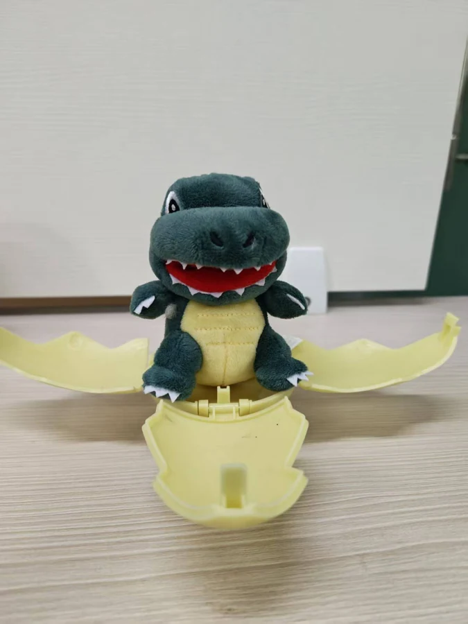 Dinosaur egg plush — dark teal character